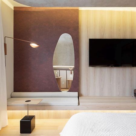 Qoya Hotel Curitiba, Curio Collection By Hilton Bagian luar foto A room at the hotel