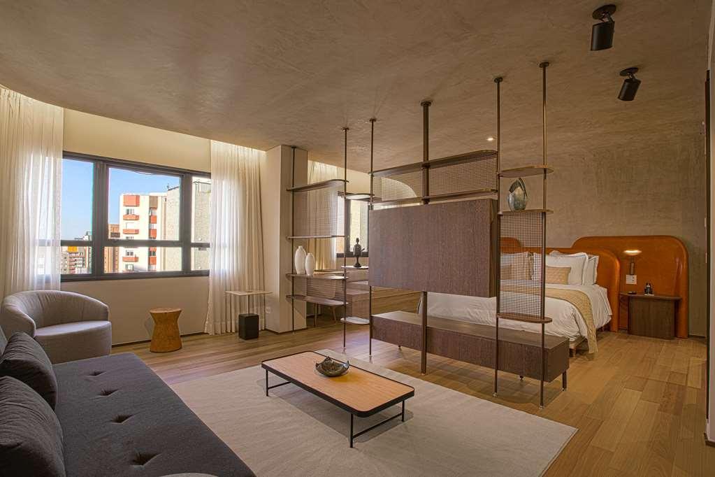Qoya Hotel Curitiba, Curio Collection By Hilton Ruang foto A room at the hotel