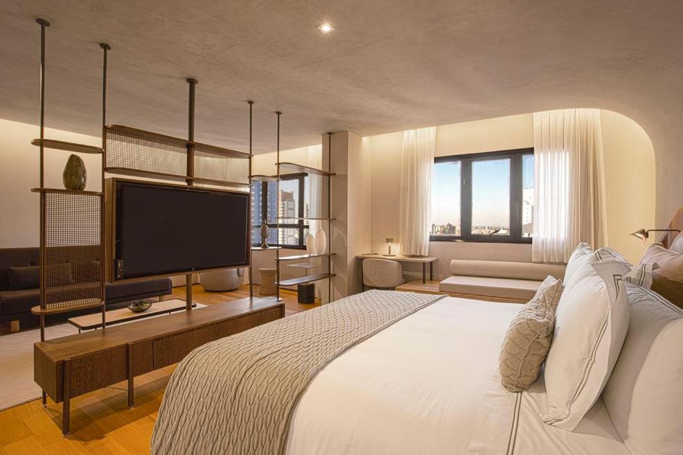 Qoya Hotel Curitiba, Curio Collection By Hilton Bagian luar foto A room at the hotel